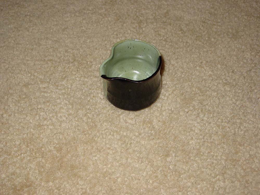 Black and green creamer